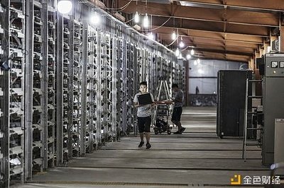 A mining farm showcases rows of specialized hardware, highlighting efficient energy consumption.
